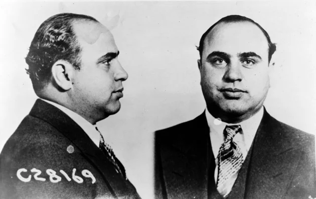 Fron and side mugshots of Al Capone